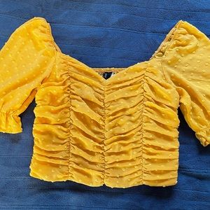crop top, mustard yellow, size Large, runs small.